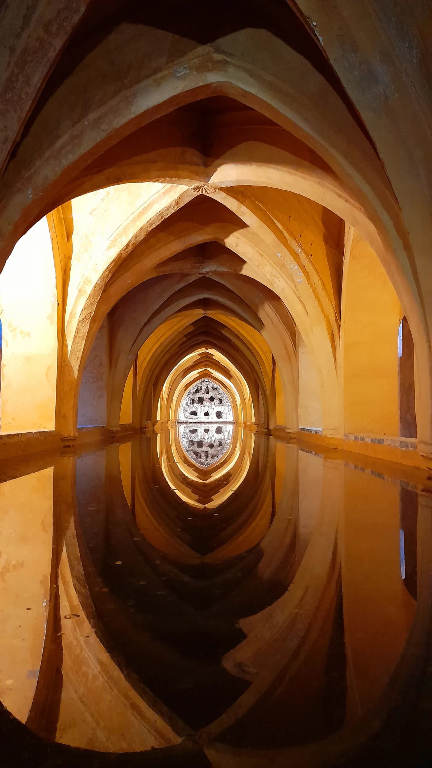 The bathing pool of Doña María de Padilla in the vaulted baths beneath the Alcázar of Seville